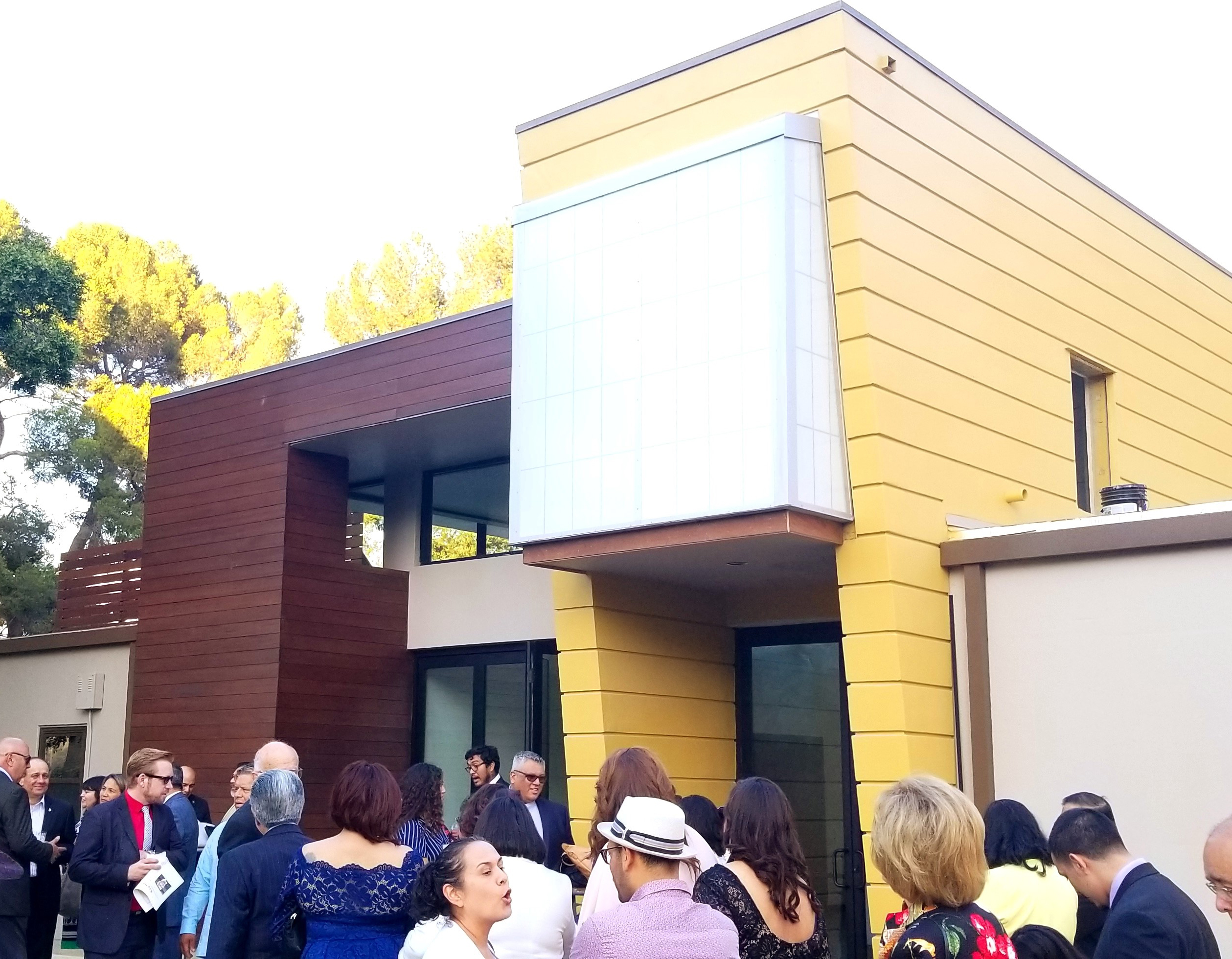 a group of people outside a building