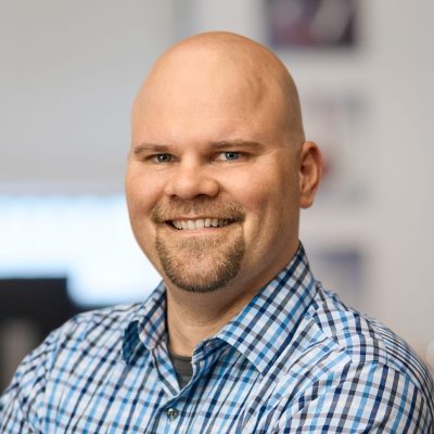 a man smiling for the camera