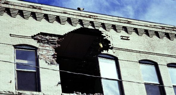 a building with a black and white sign on it