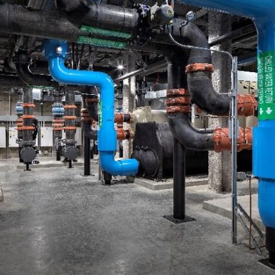 a factory with blue pipes