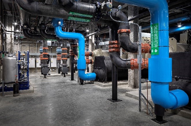a factory with blue pipes