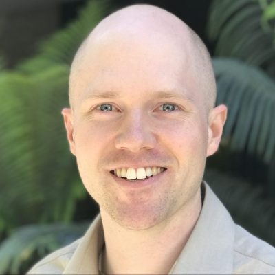 a man smiling for the camera